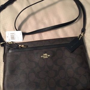 Authentic coach cross bag new with tags never used